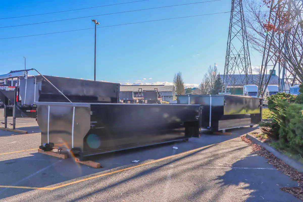 Roll-off dumpster ready for waste disposal at job site for 3 Yard Dumpster Rental in Greenfield